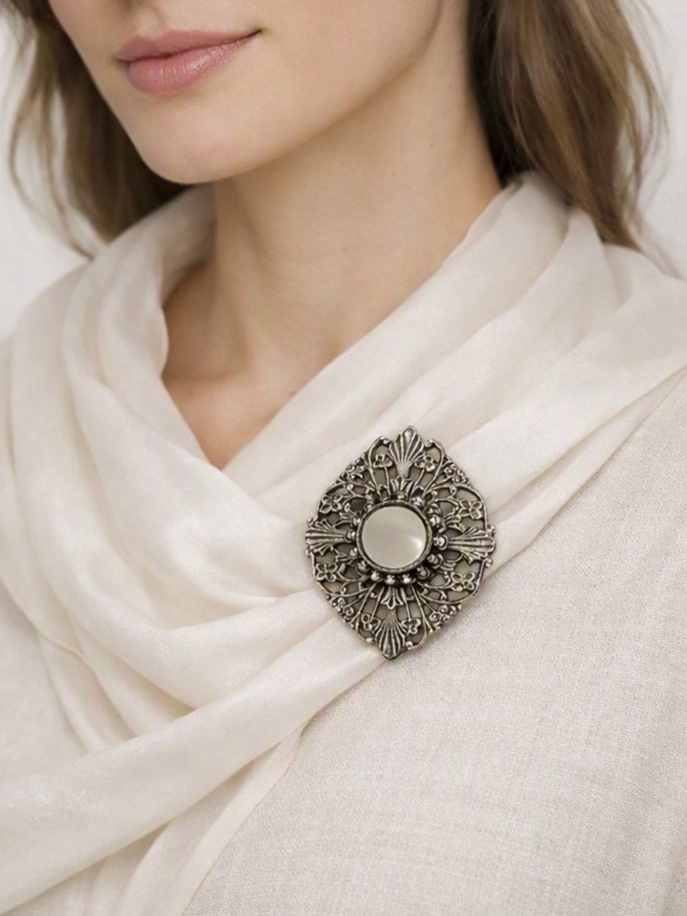 Elegant Silver tone Filigree Brooch with mother of pearl center